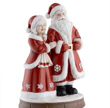 Load image into Gallery viewer, Statue of Santa Claus and Mrs. Claus holding hands on a white background