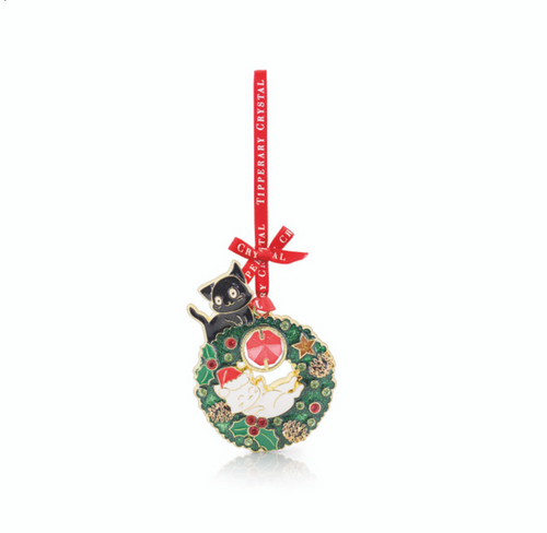 Christmas ornament with a cat and wreath design on a white background
