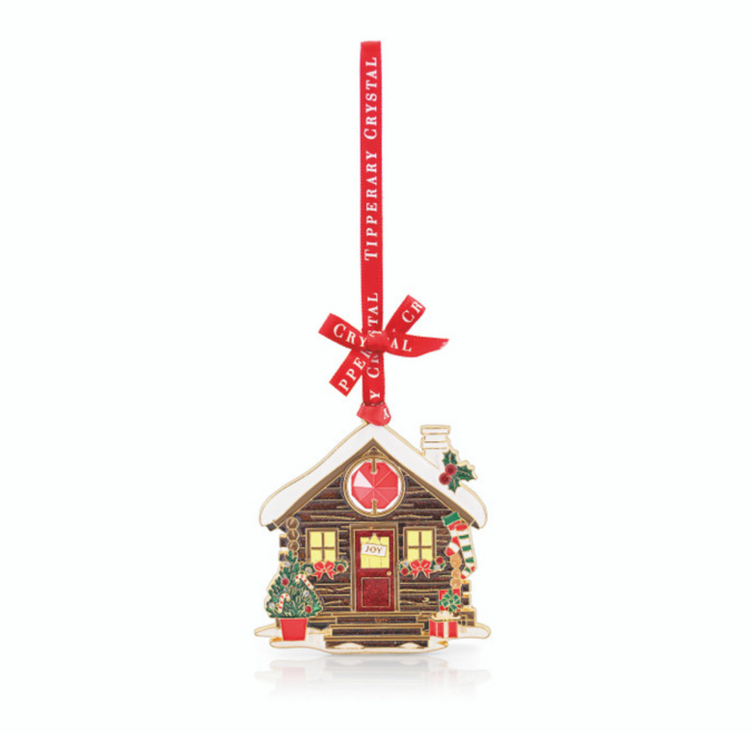 Decorative cabin ornament with a red ribbon and 'Crystal Tipperary' text on a white background