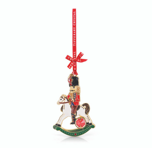 Christmas ornament with a soldier on a rocking horse, featuring Royal Doulton branding.